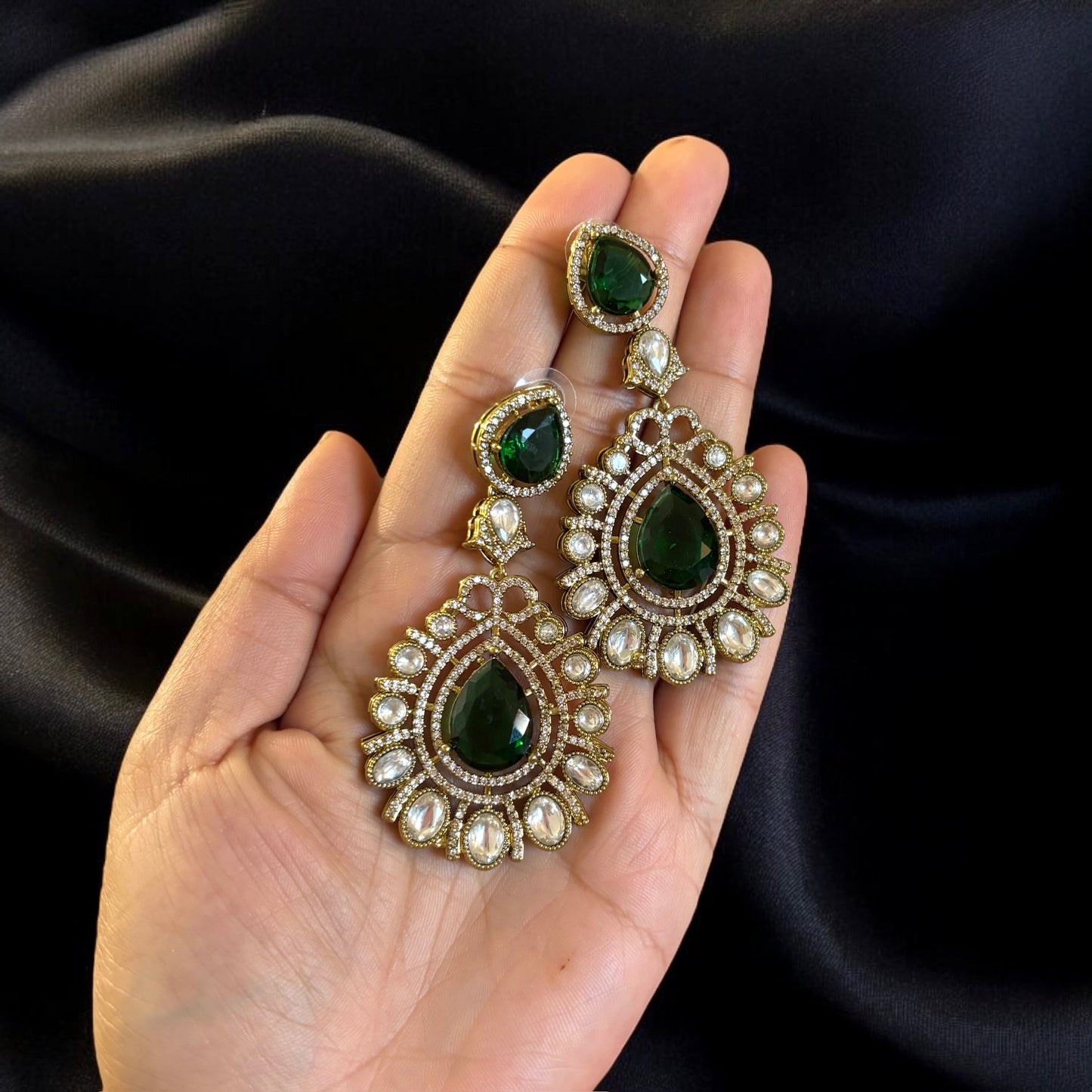 Gold plated green kundan earrings
