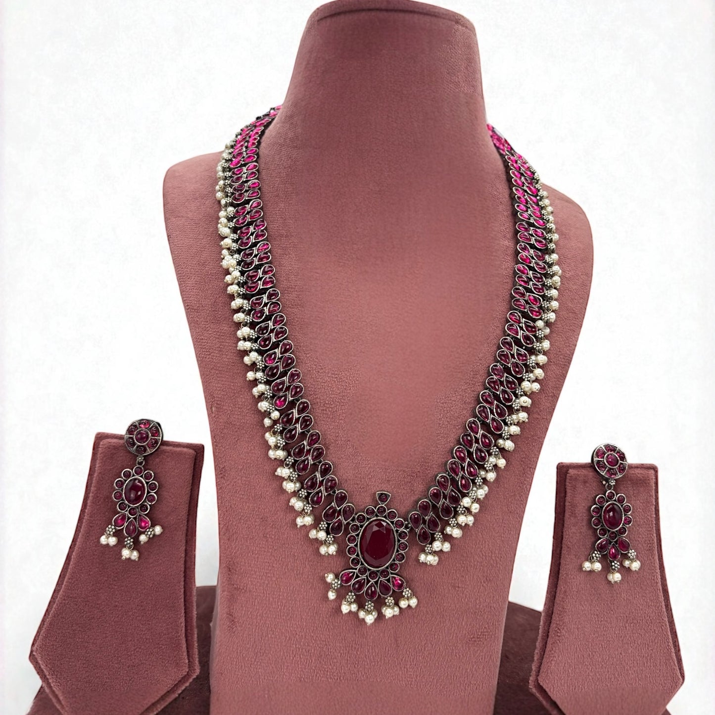 Silver oxidized long necklace set with dark pink stones
