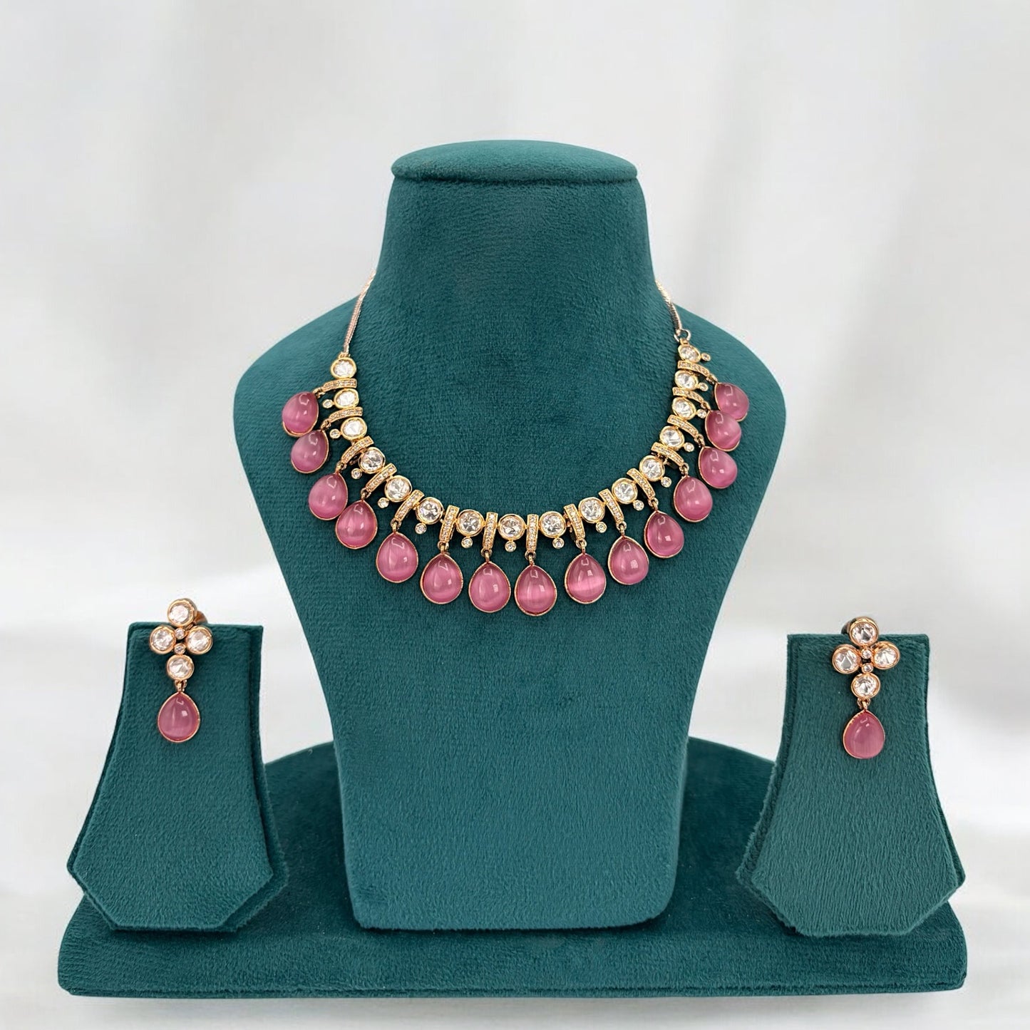 Gold plated kundan necklace set with pink stones