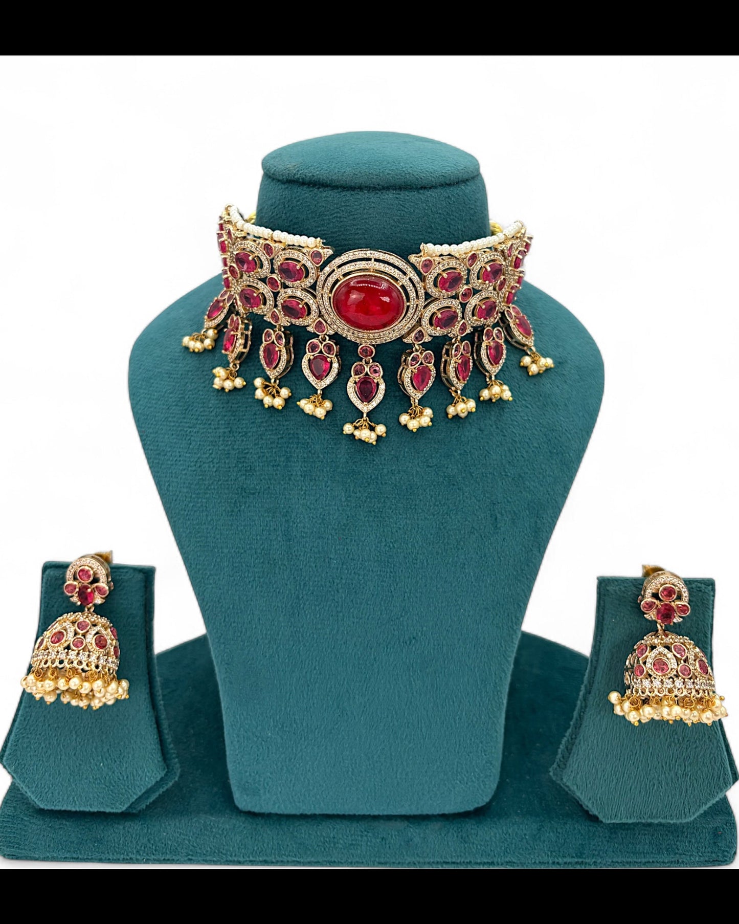 Gold plated choker with red/pink stones