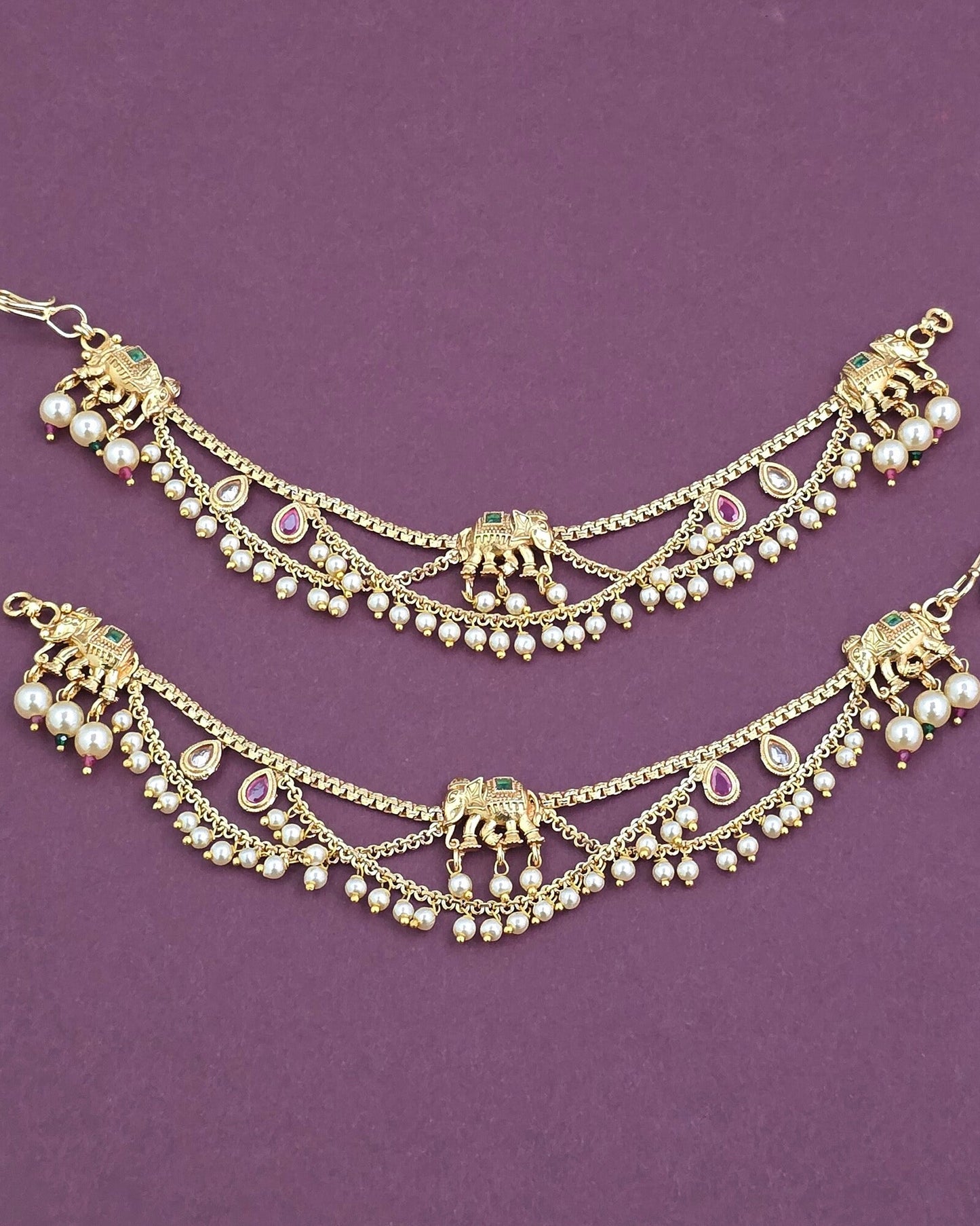 Gold plated ear chains with elephant