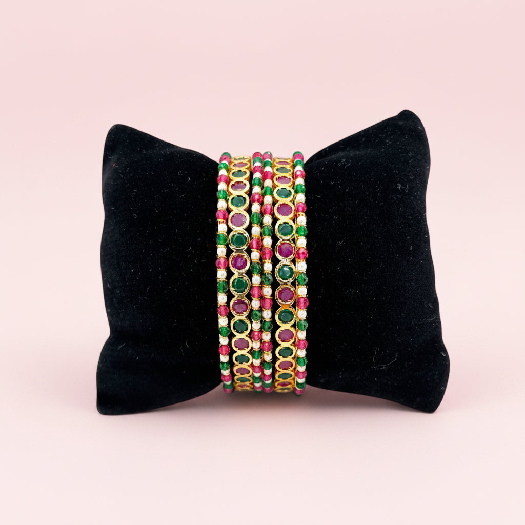 Gold plated dark pink and green bangles set