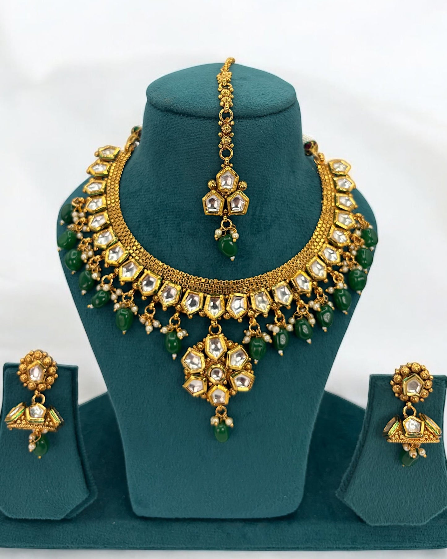 Gold plated kundan necklace set with green beads