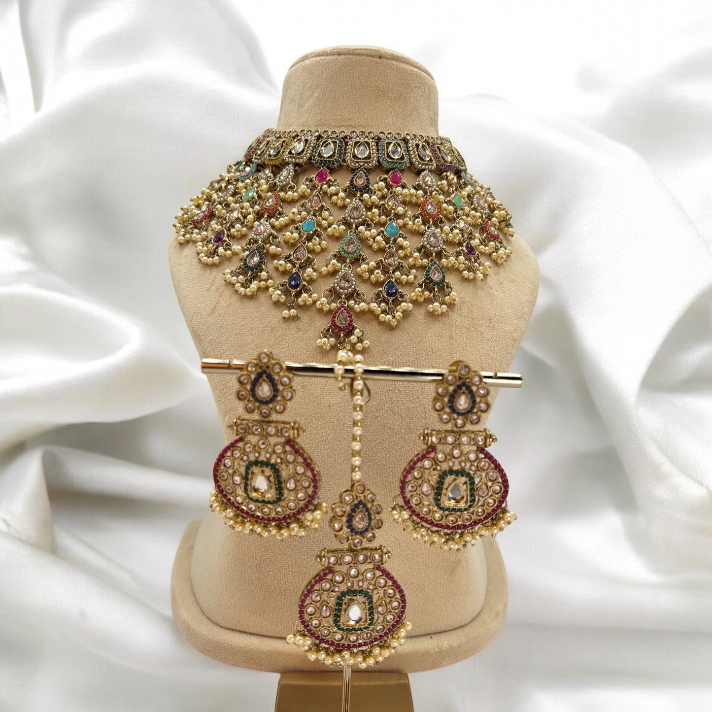 Elegant full necklace set with earrings and mang tikka.