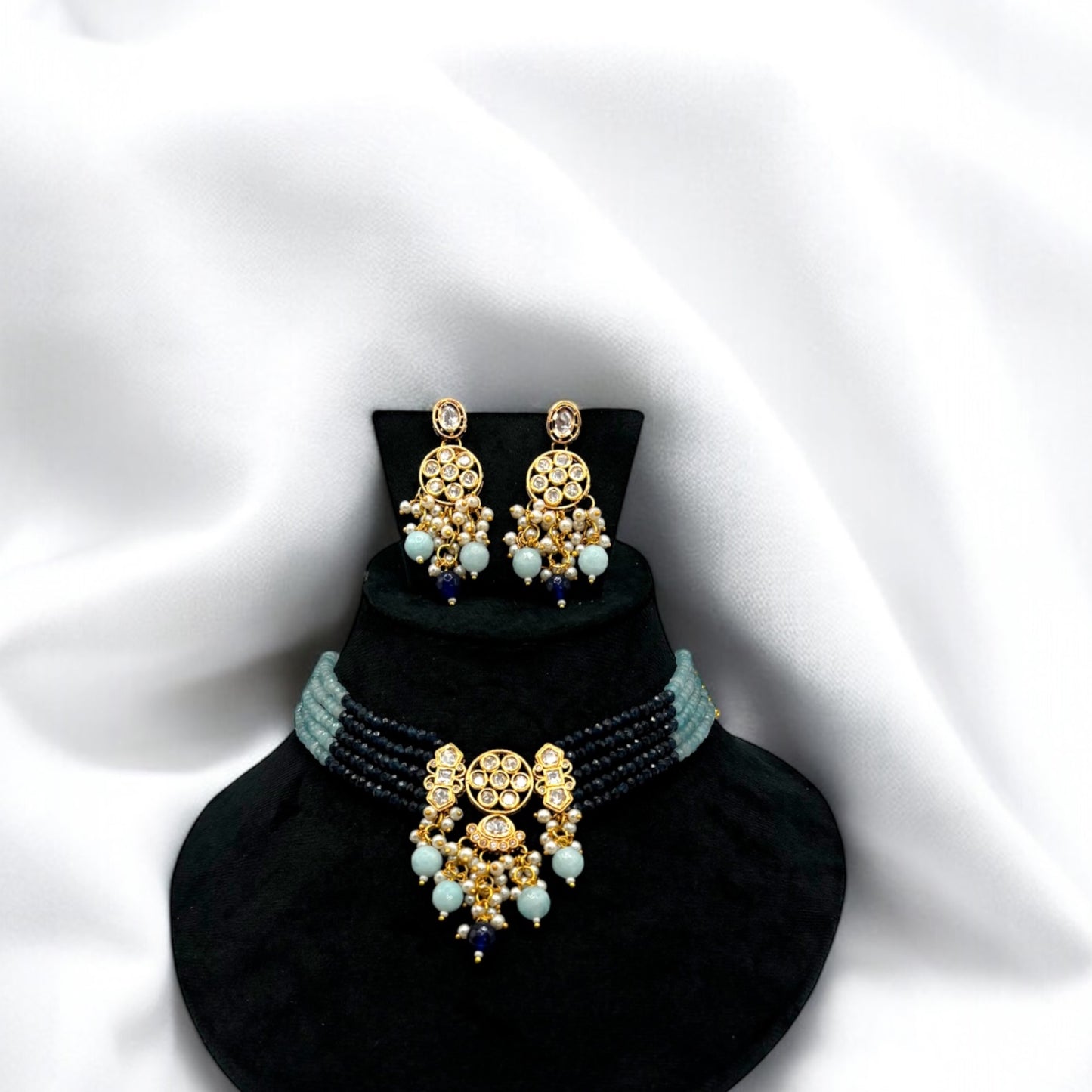 Gold plated kundan choker set with blue beads