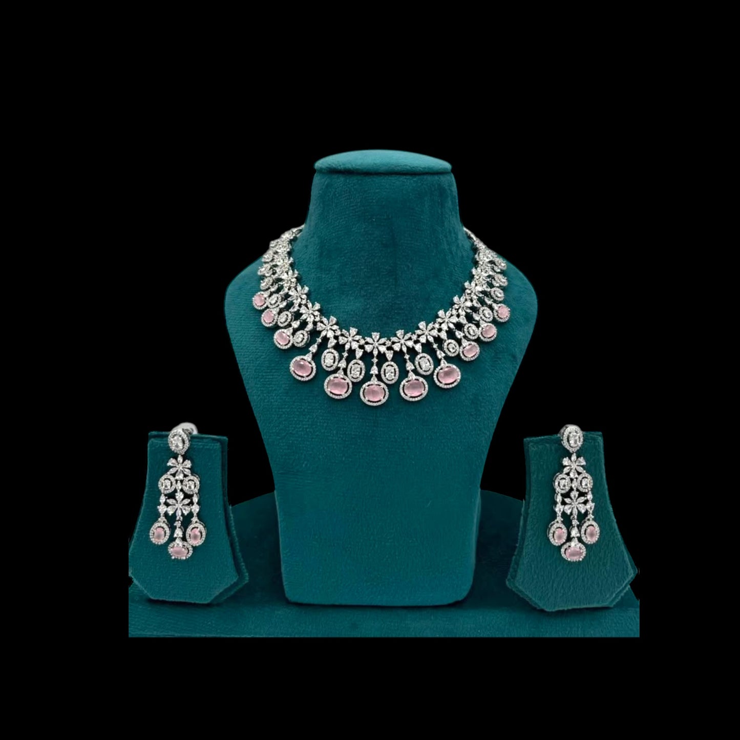 Rhodium plated pink American Diamond necklace set with earrings.