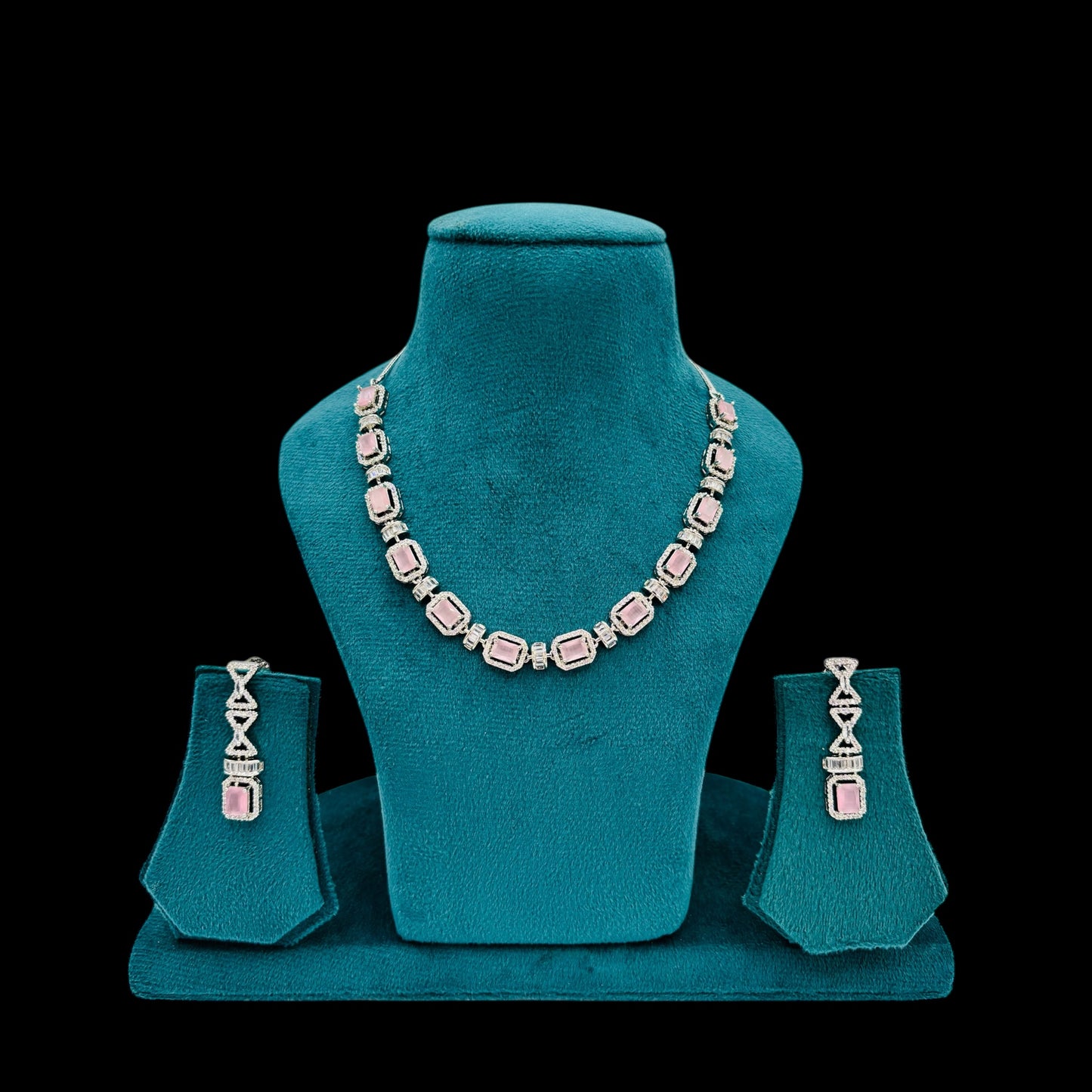 Rhodium plated pink American Diamond necklace set with earrings.