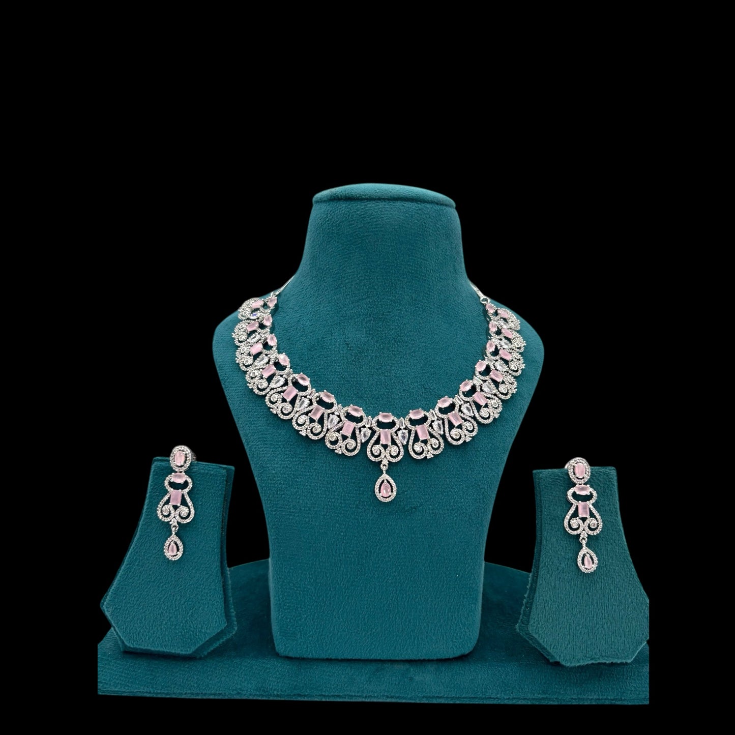 Rhodium plated designer pink American Diamond necklace set with earrings.