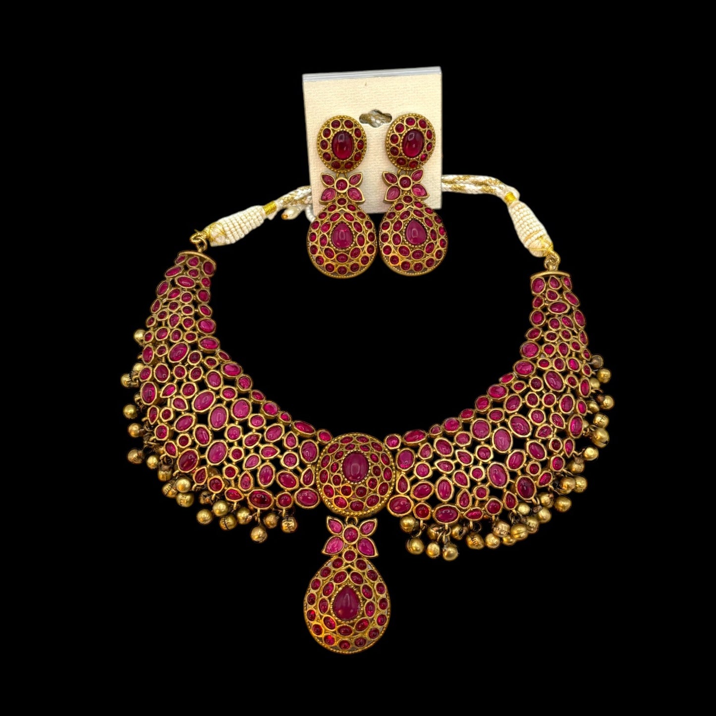 Contemporary gold necklace set