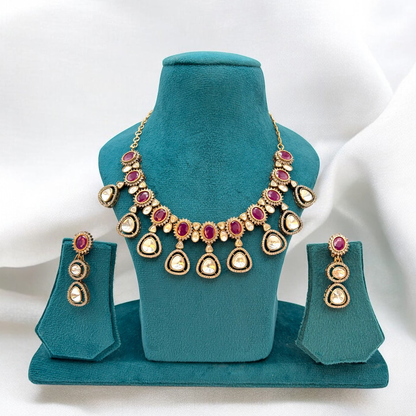 Premium quality moissanite, kundan and ruby stones necklace set with earrings.