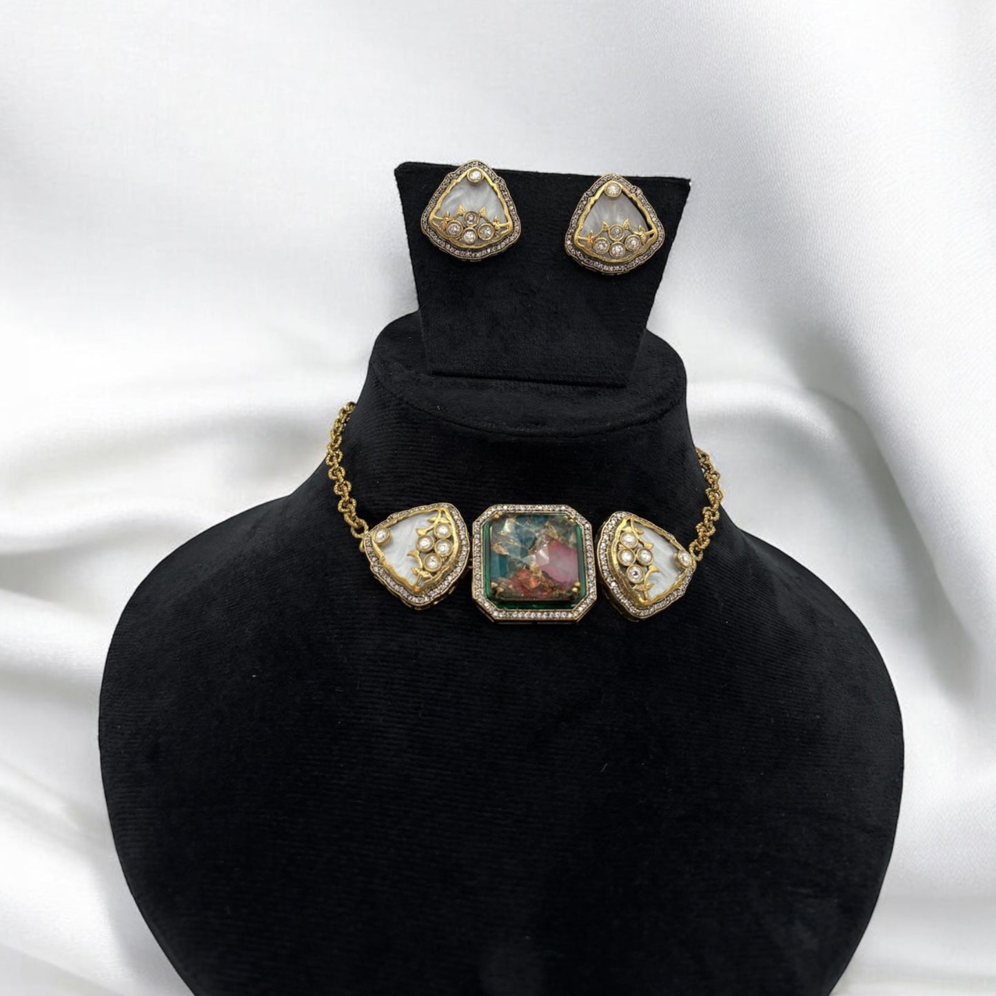 Premium kundan and italian stones choker set with studs.