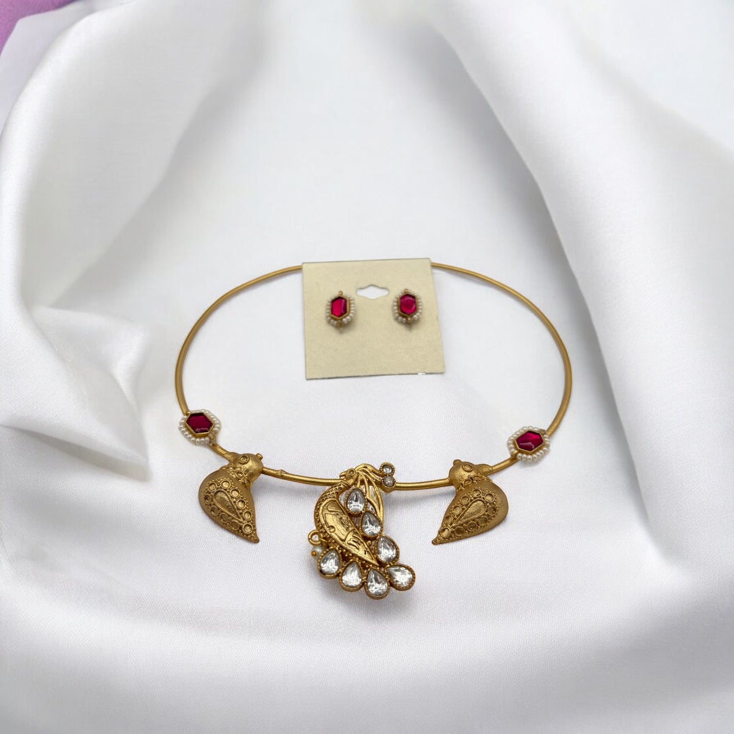 Elegant gold plated hasli set with pachi kundan .