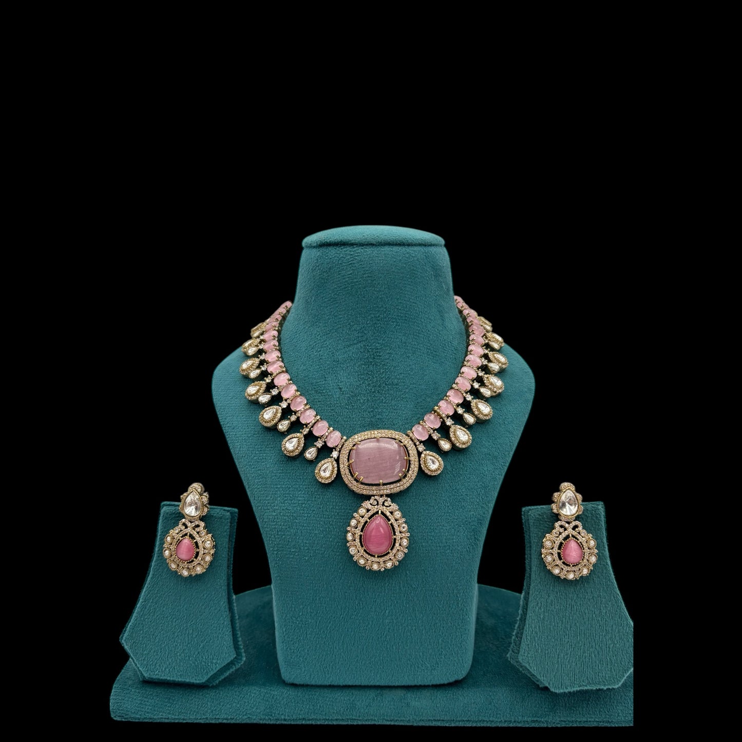 Premium quality pink necklace set with moissanite and kundan stones paired with earrings.