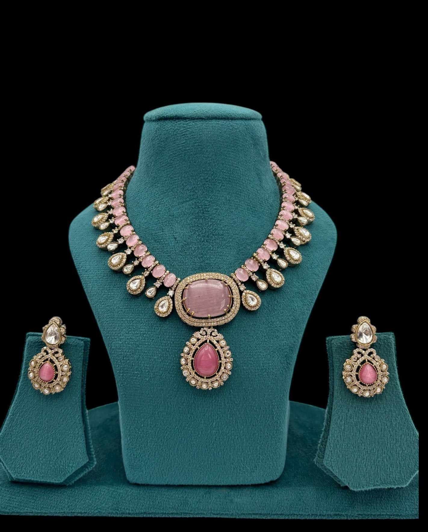 Premium quality pink necklace set with moissanite and kundan stones paired with earrings.