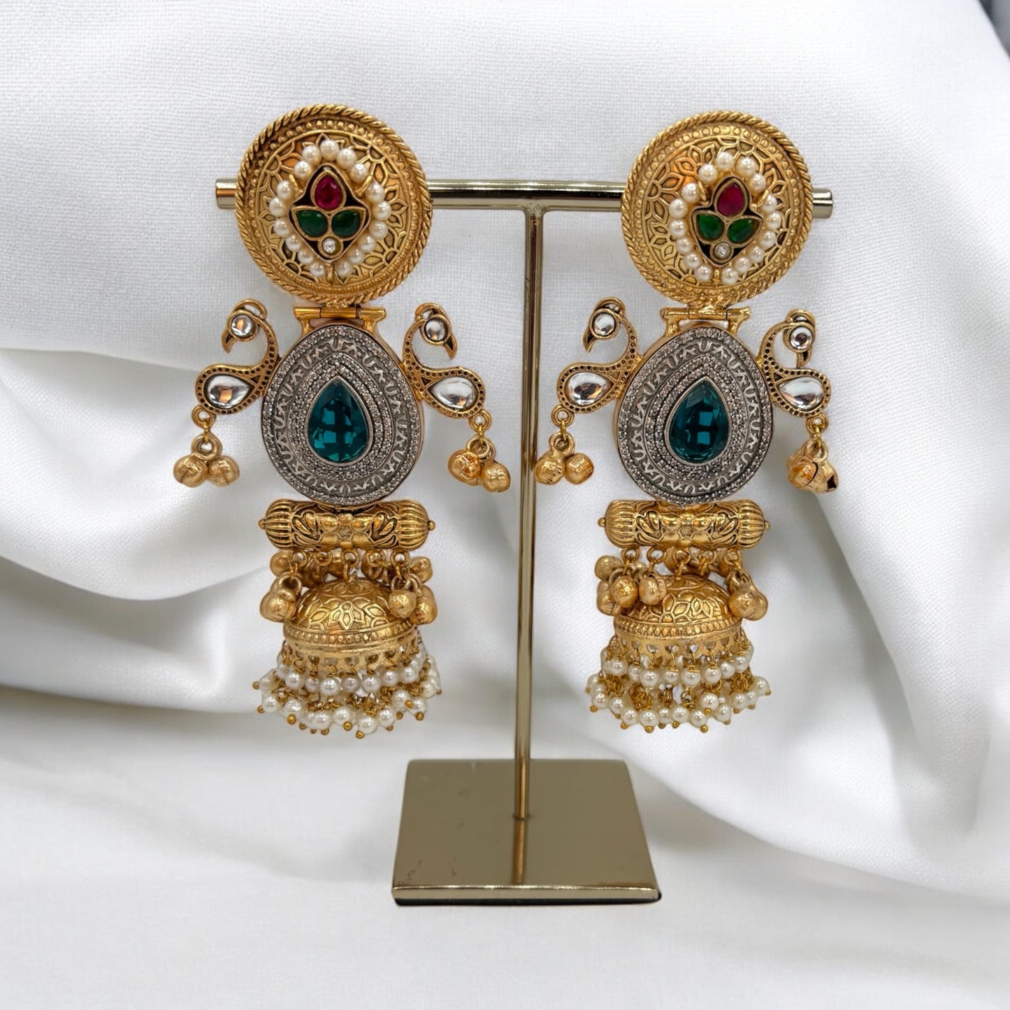 Dual tone pachi kundan, AD and green stone earrings