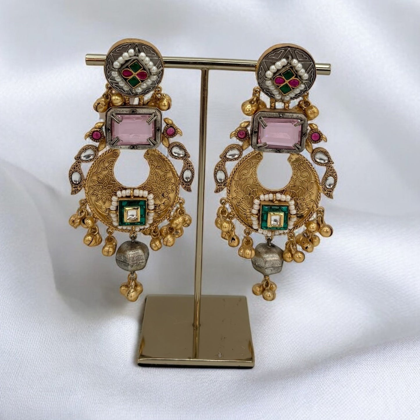 Dual tone pachi kundan earrings with pink stones.