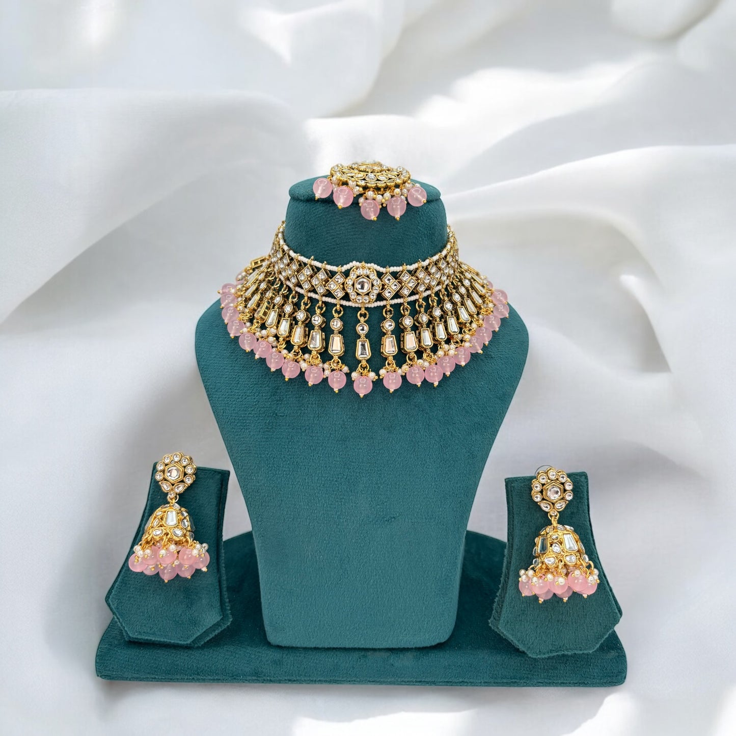 Pink choker set with jhumki and matha tikka