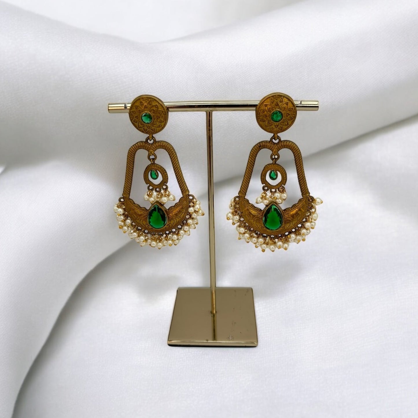 Antique gold earrings with green stones