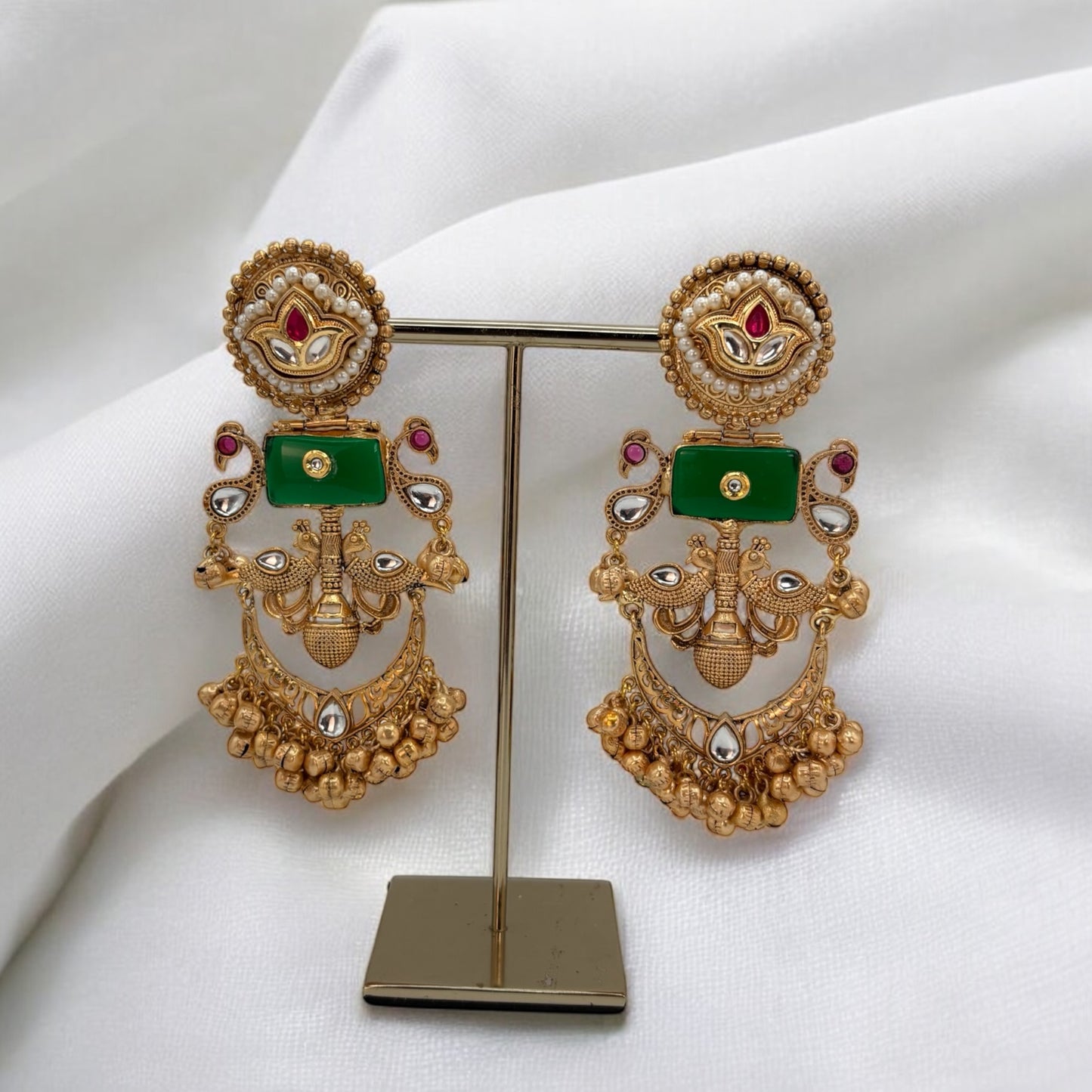 Handmade gold tone pachi kundan earrings.