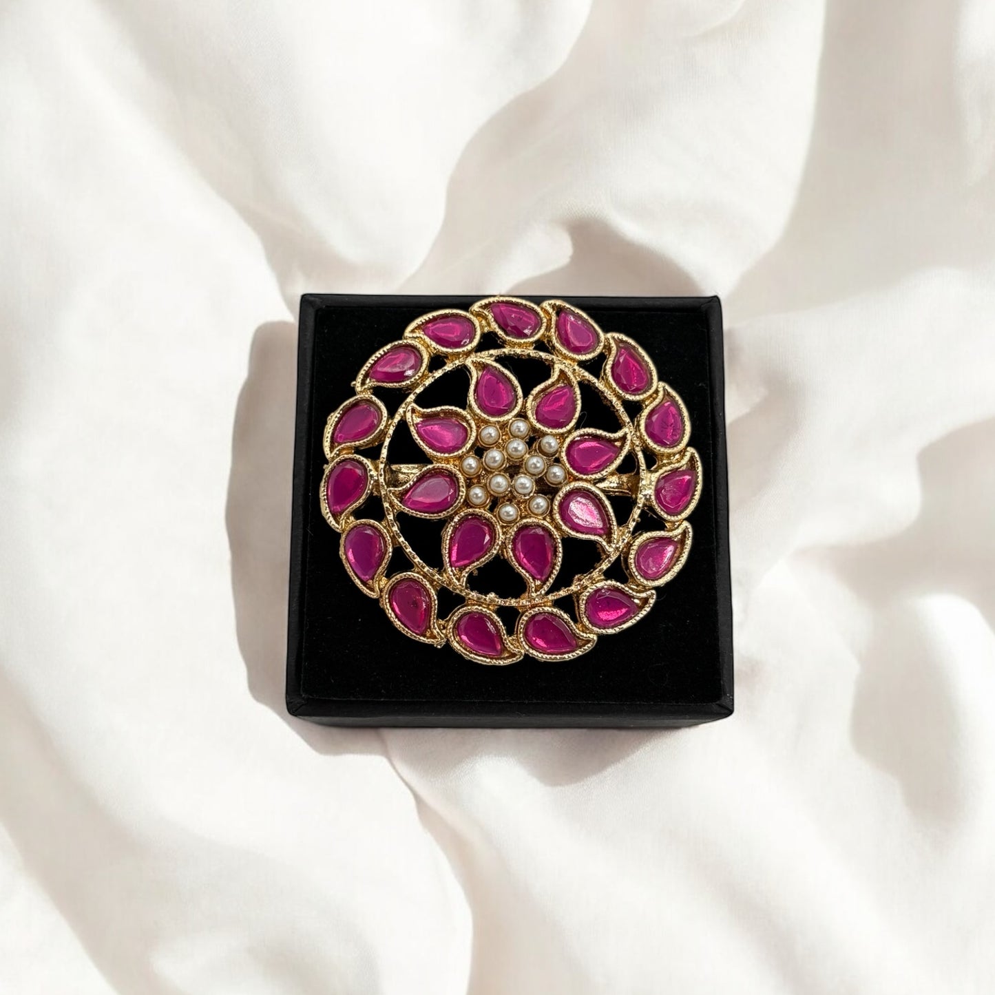 Adjustable ring with pink stones