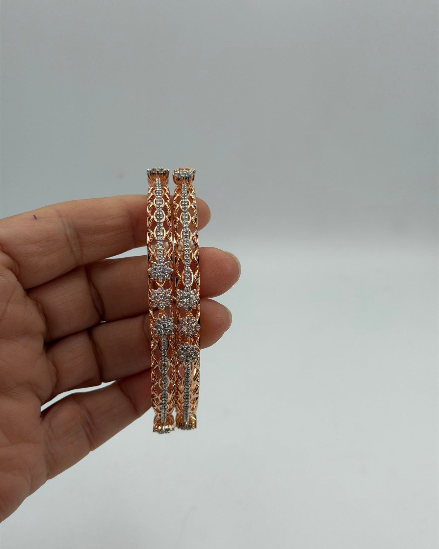 Cz bangles with rose gold plating