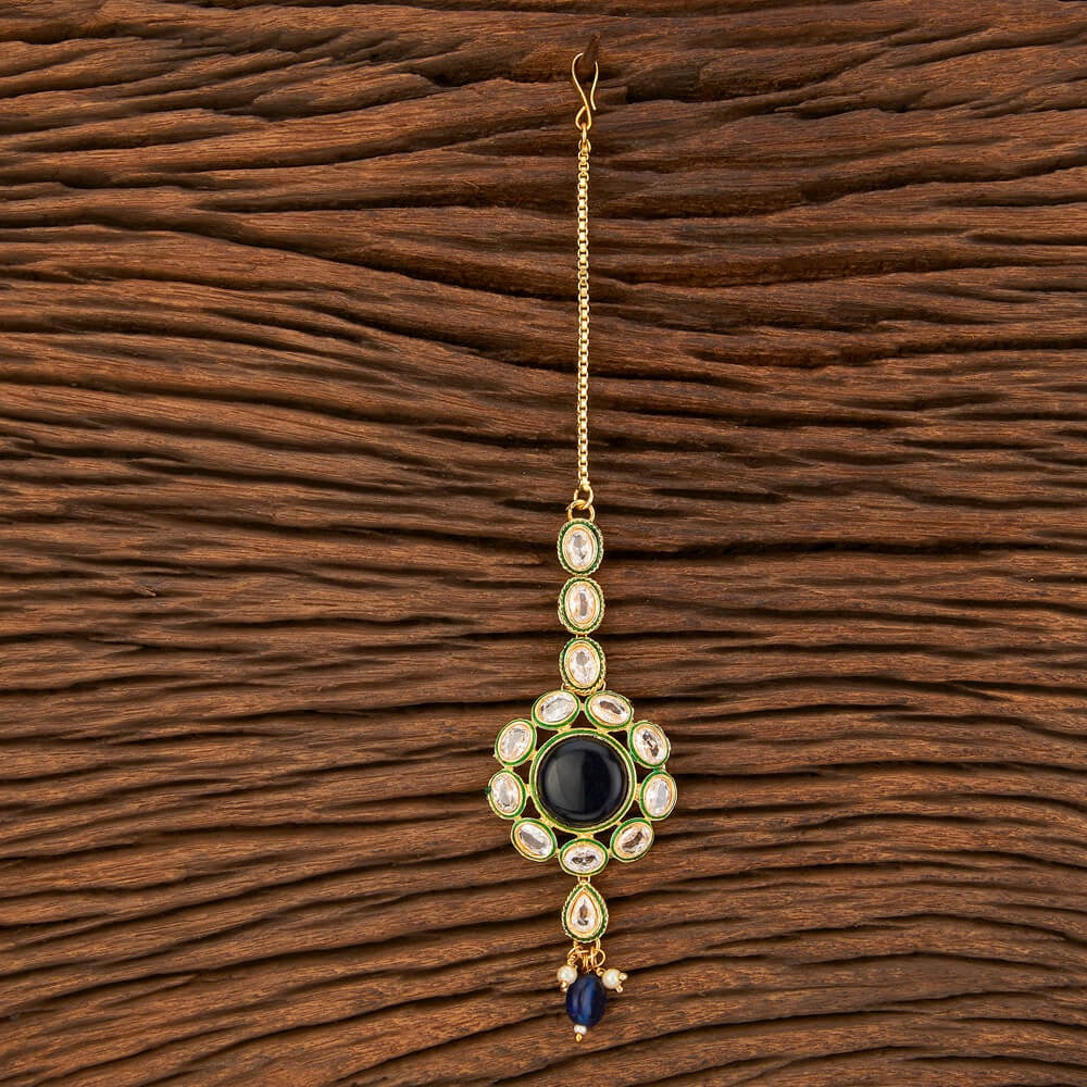 Gold plated blue kundan mang tikka
