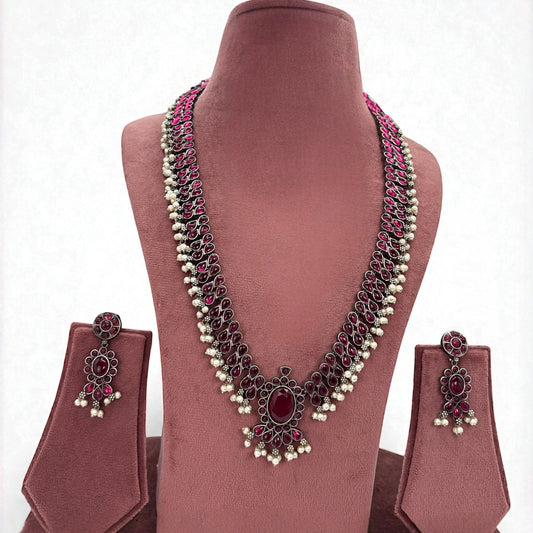 Silver oxidized long necklace set with dark pink stones