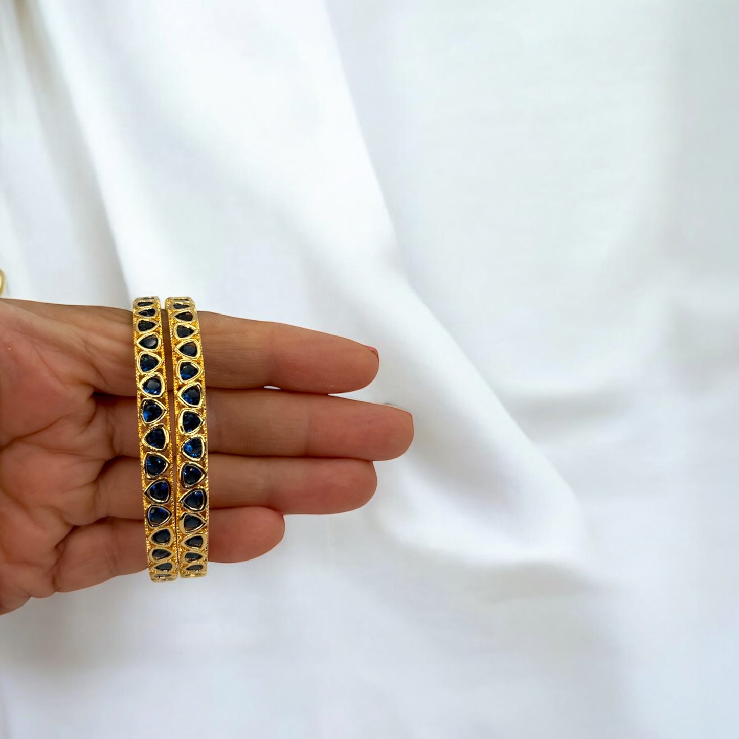 Gold plated blue American Diamond bangles