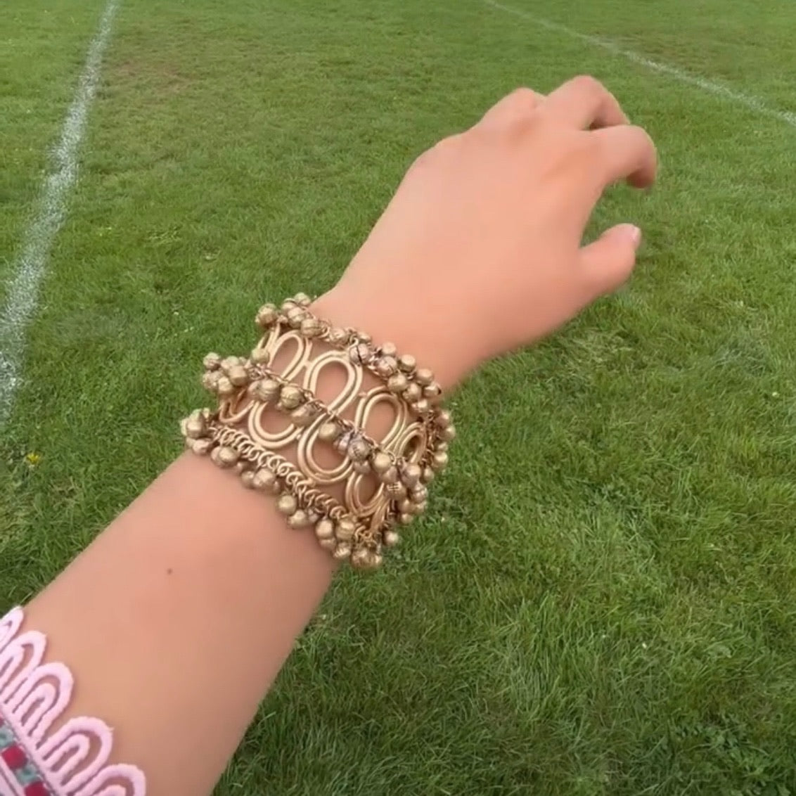 Gold plated broad bracelet with matte finish
