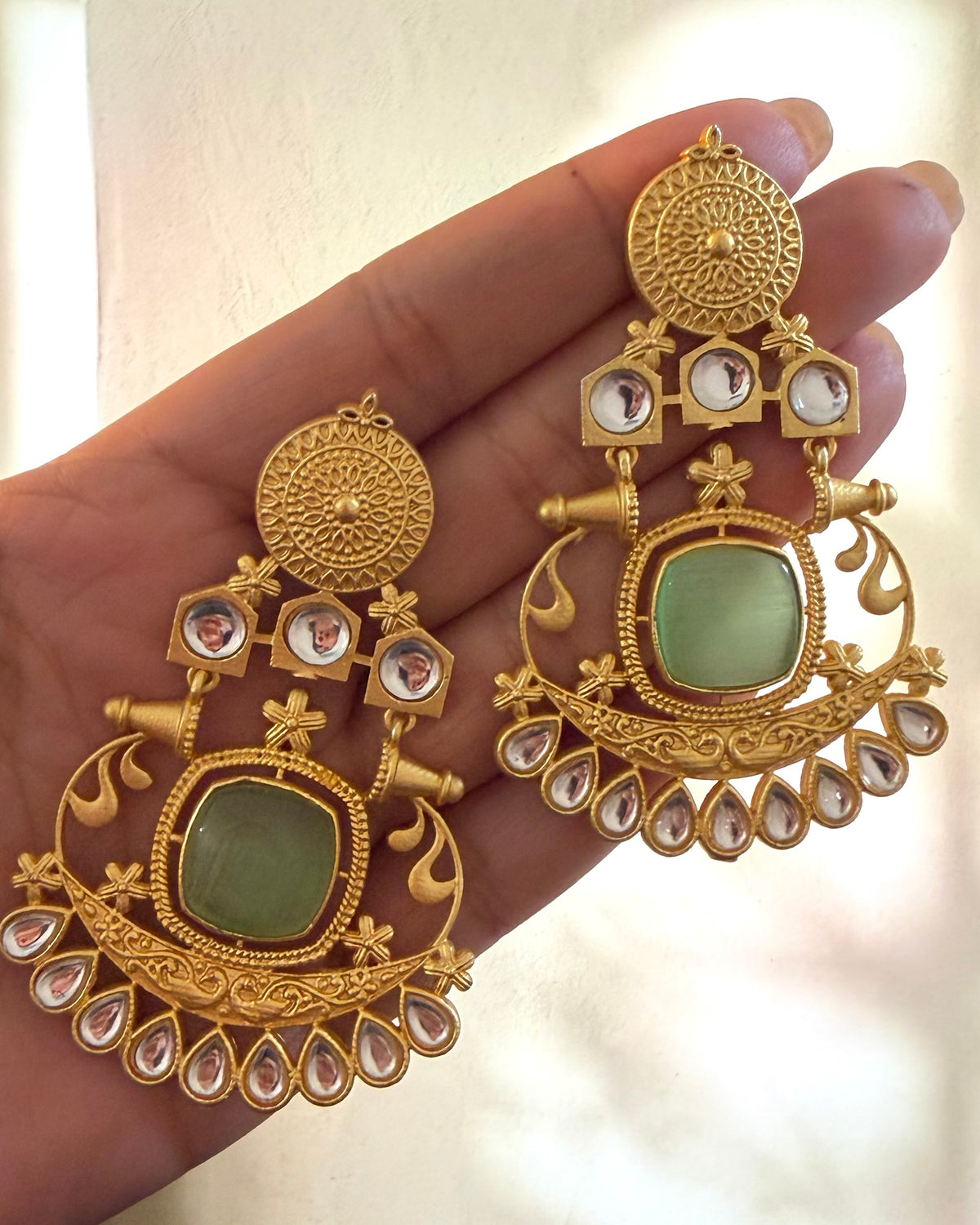 Golden kundan earrings