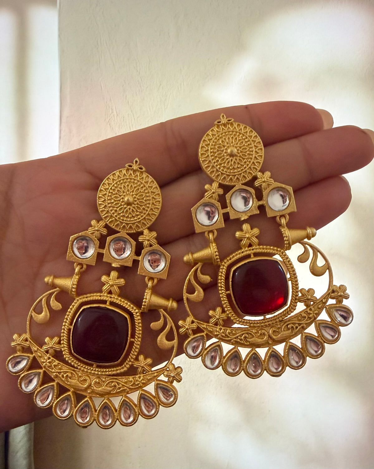 Golden kundan earrings