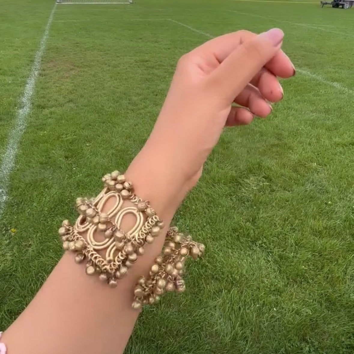 Gold plated broad bracelet with matte finish