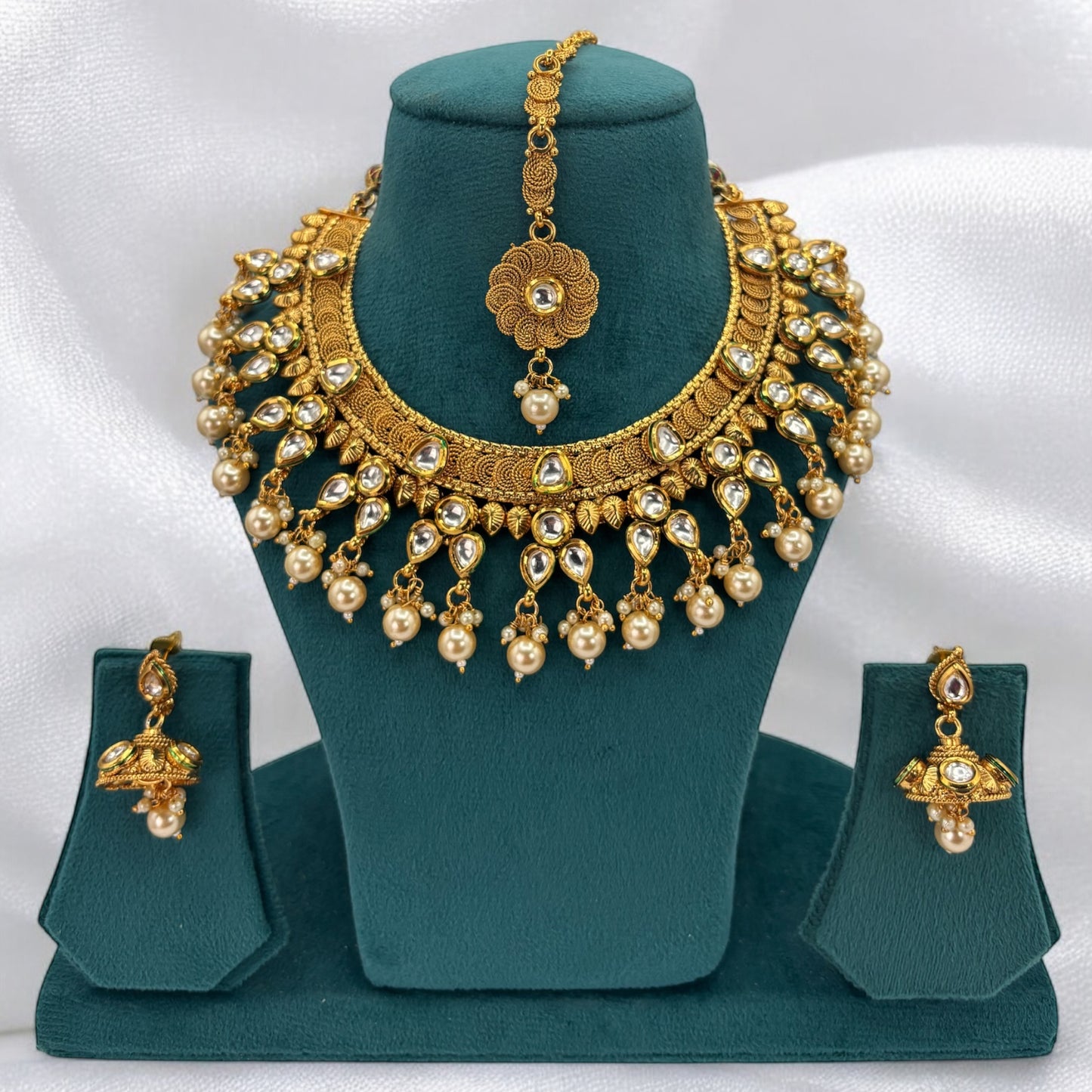 Gold plated kundan necklace set with white beads