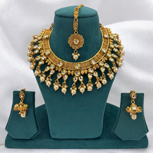 Gold plated kundan necklace set with white beads
