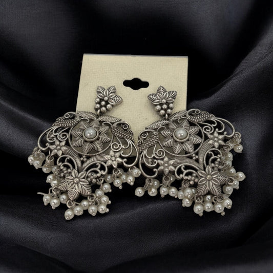 German silver earrings with white beads