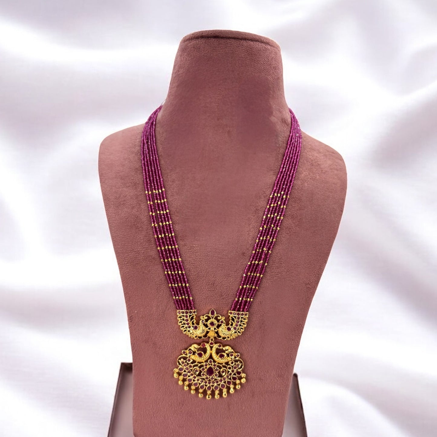 Gold plated pendant with ruby stones mala