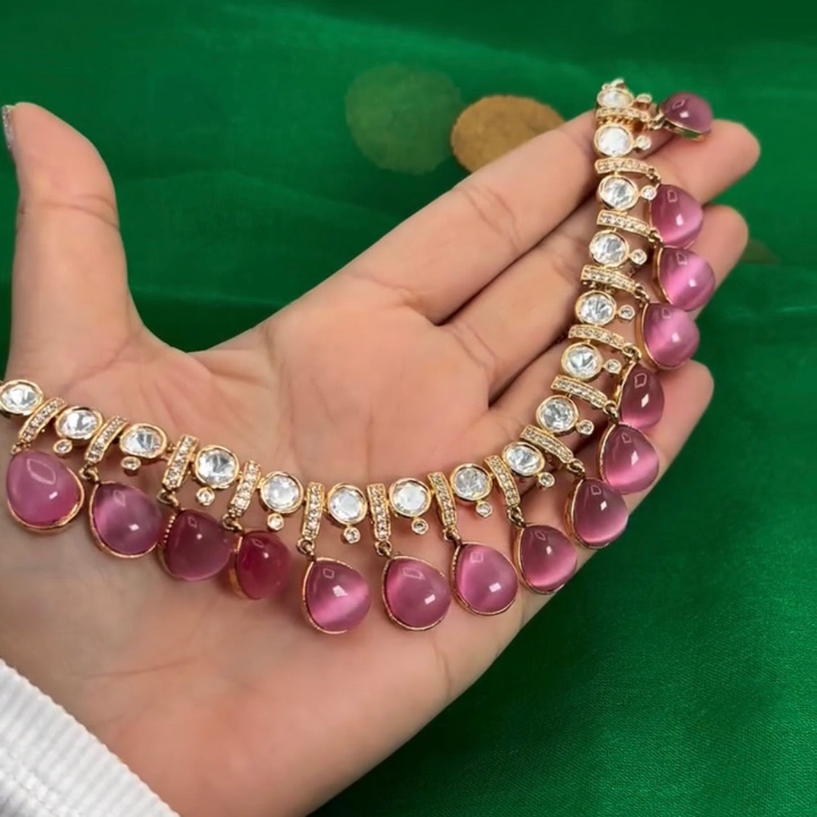 Gold plated kundan necklace set with pink stones