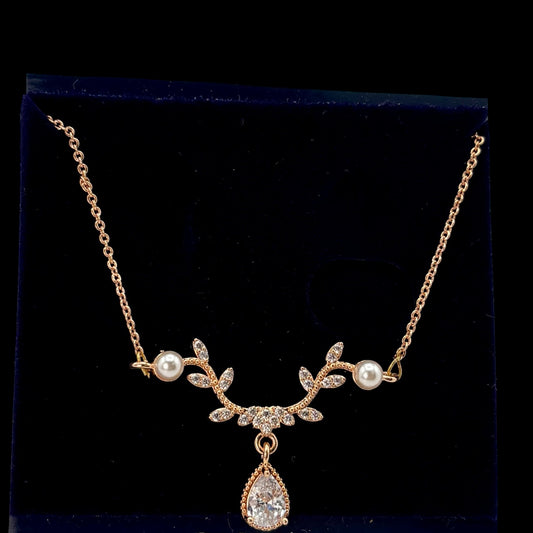 Gold plated chain pendant.