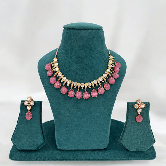 Gold plated kundan necklace set with pink stones