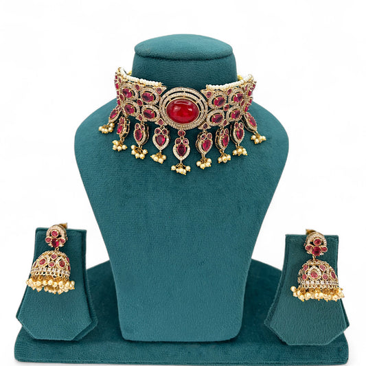 Gold plated choker with red/pink stones