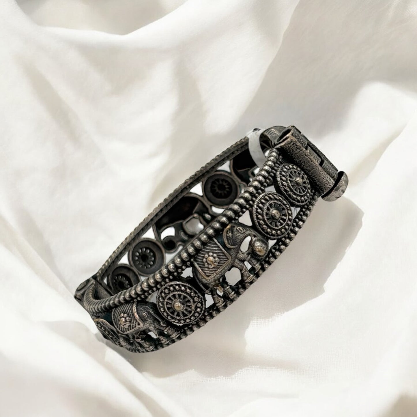 Silver oxidized openable handcrafted kada/bracelet.