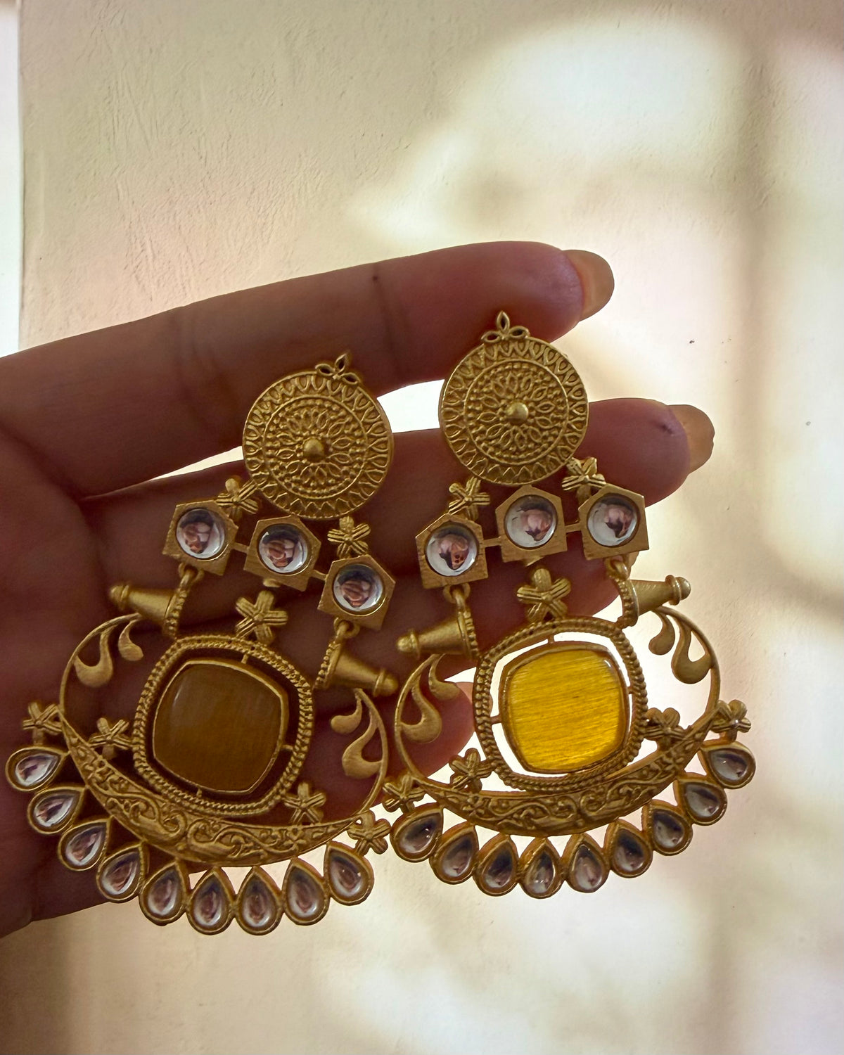 Golden kundan earrings