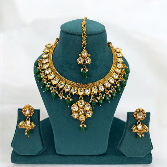 Gold plated kundan necklace set with green beads