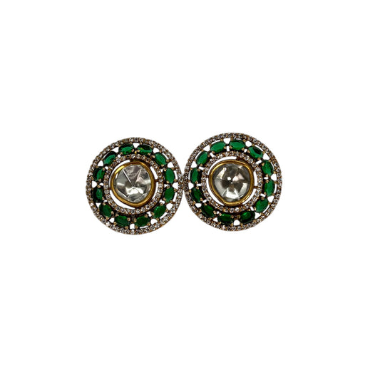 Uncut kundan studs with emerald green stones