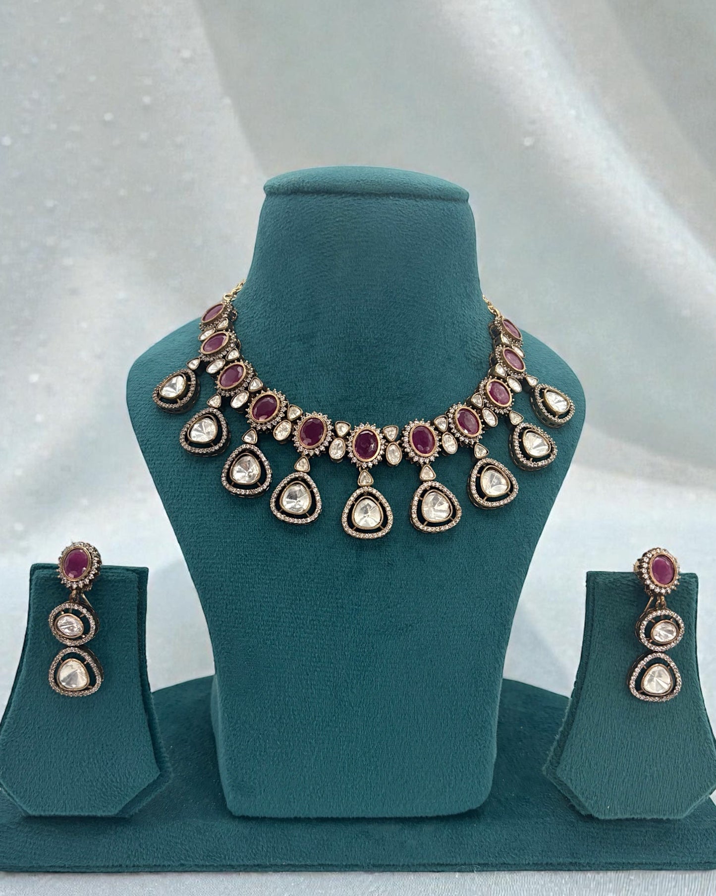 Premium quality moissanite, kundan and ruby stones necklace set with earrings.