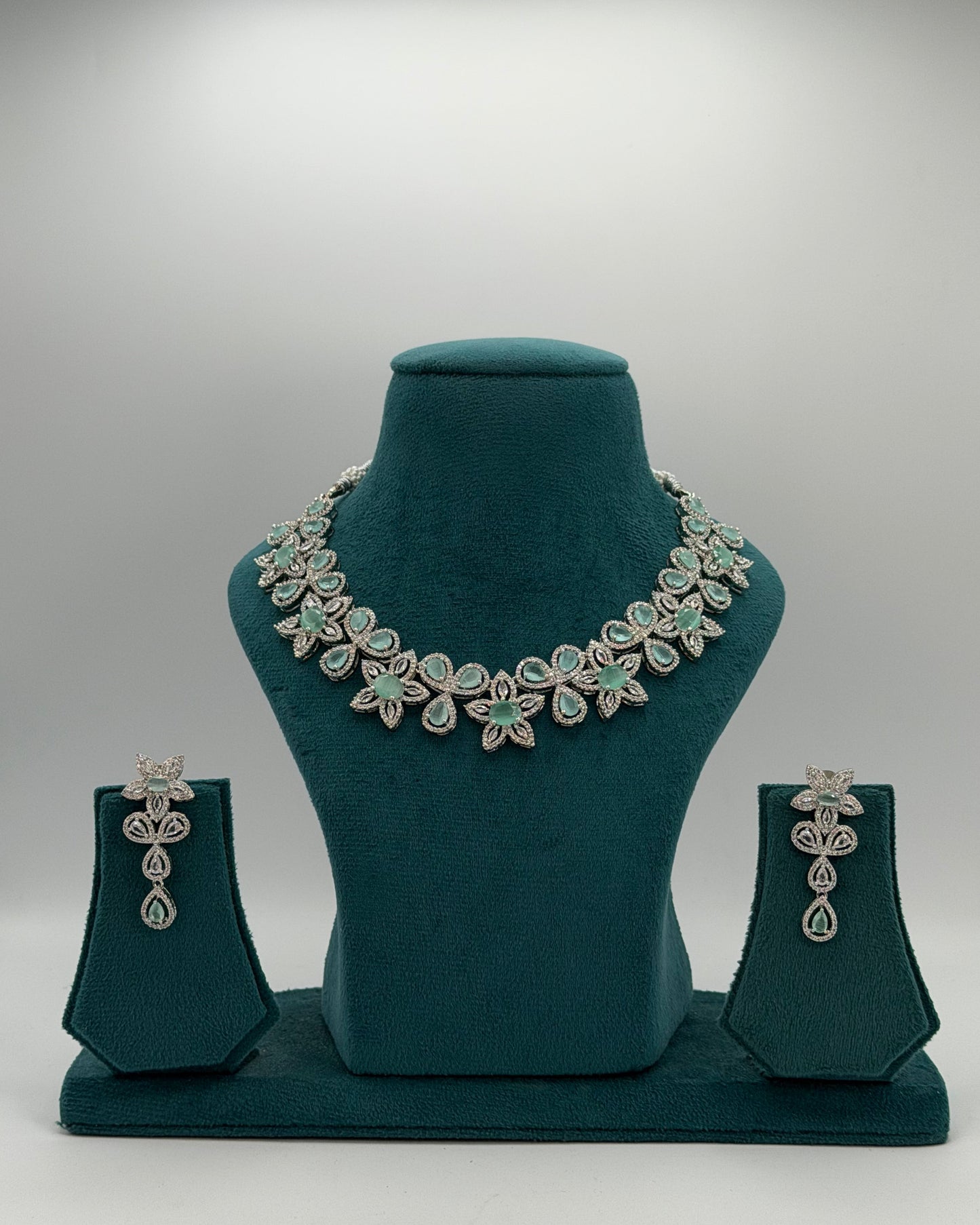 Pastel green American Diamond necklace set with earrings.