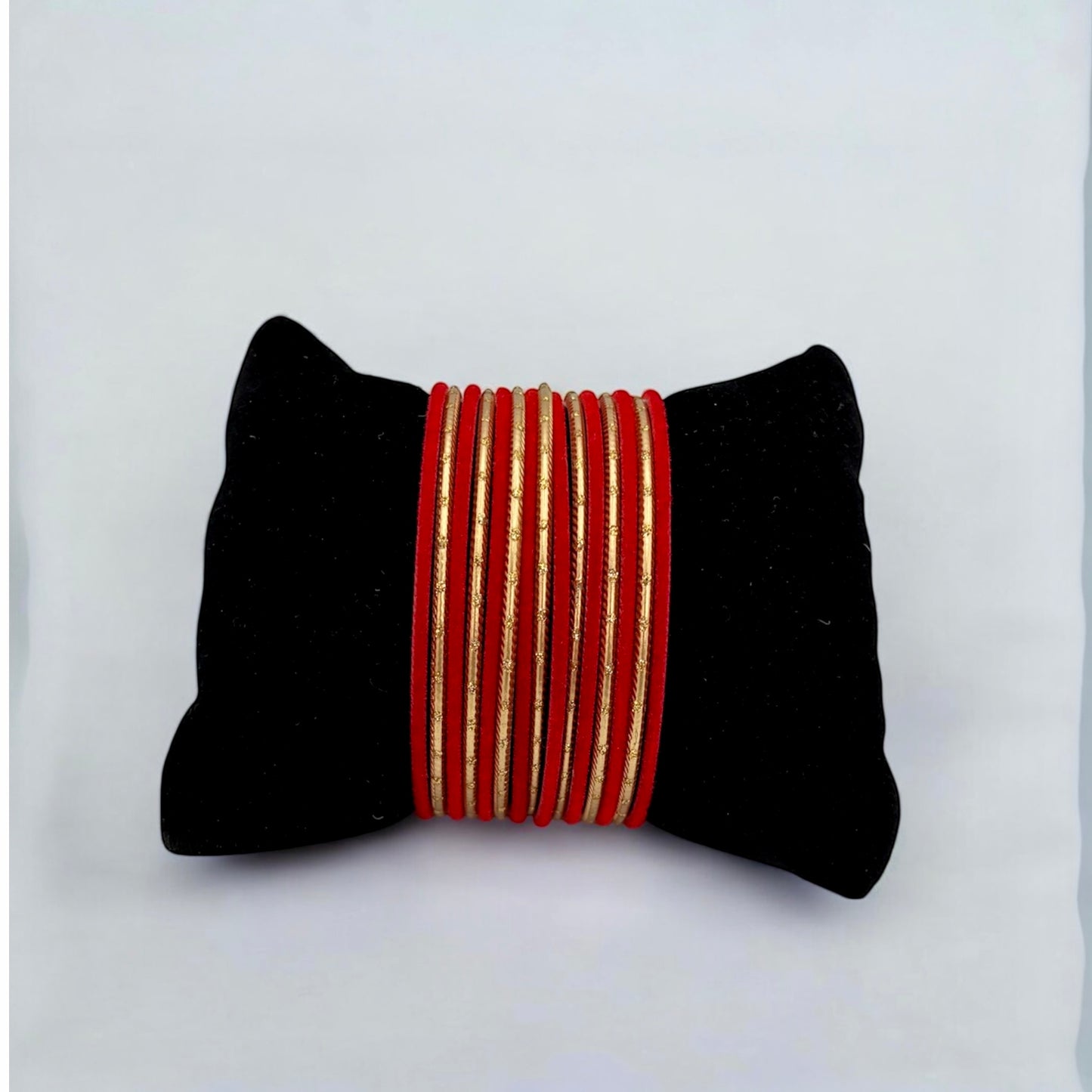 Set of red and gold bangles