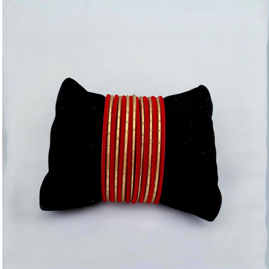 Set of red and gold bangles