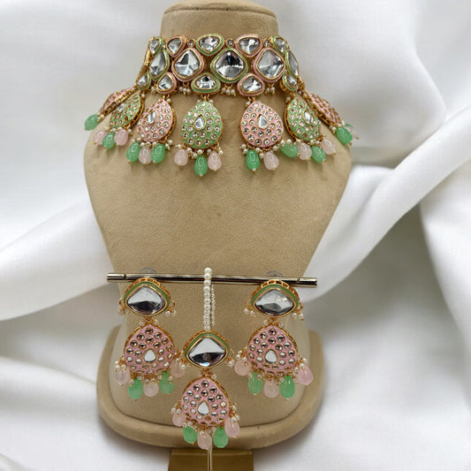 Party wear pastel pink and mint colour choker set with earrings and mang tikka.