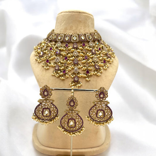 Elegant full necklace set with earrings and mang tikka.